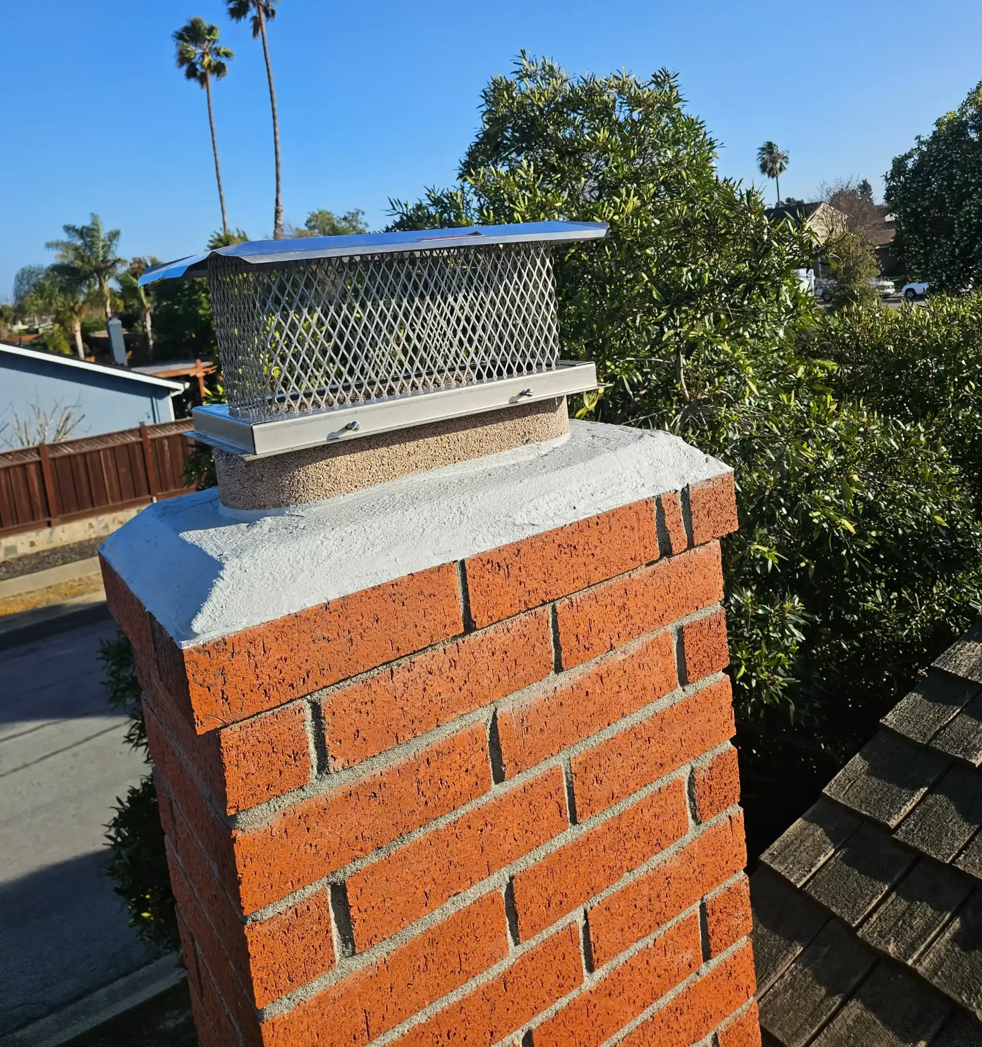Deteriorated chimney masonry before restoration
