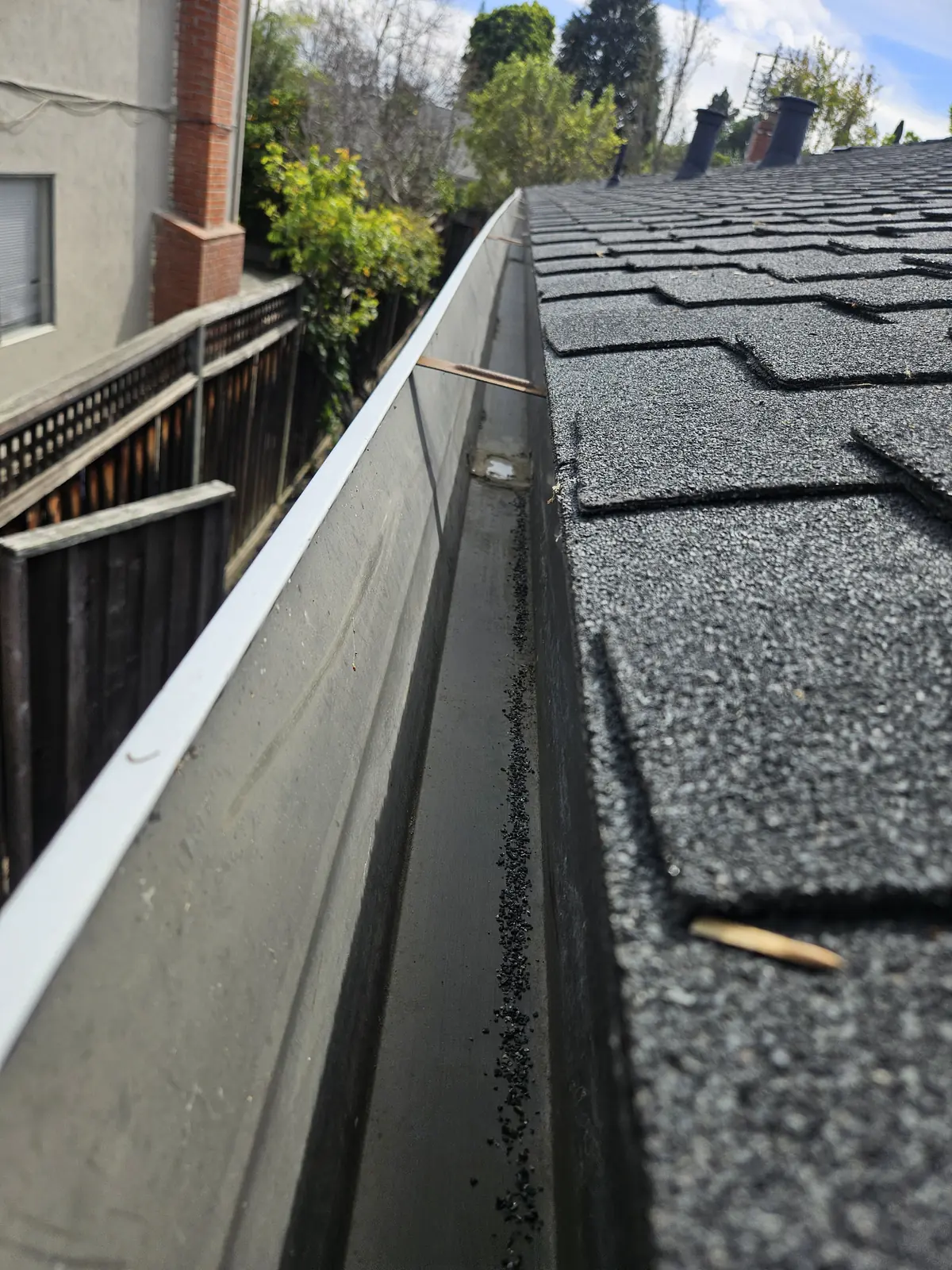 Gutter cleaning on a South Bay home